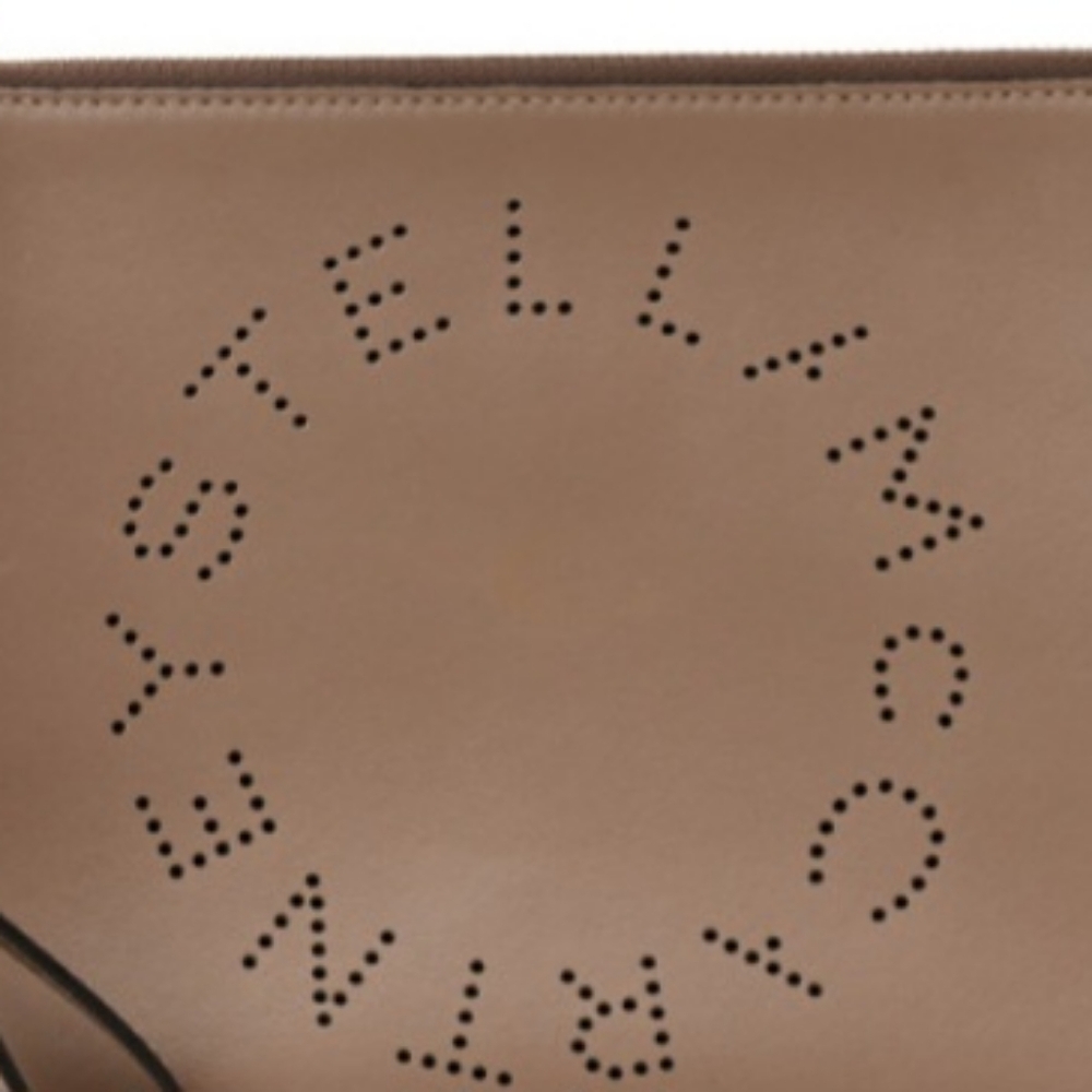 Stella McCarthy Tan clutch